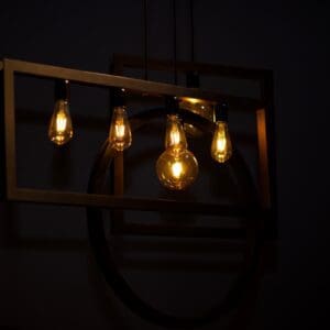 A group of light bulbs hanging from the ceiling.